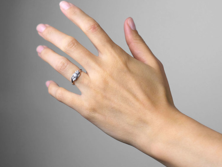 Diamond Single Stone Diamond Ring with Diamonds on Either Side