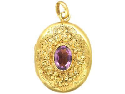 Victorian Oval Gilt Metal Locket set with Amethyst Paste