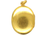 Victorian Oval Gilt Metal Locket set with Amethyst Paste
