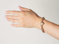 Edwardian 9ct Rose Gold Three Hearts Curb Bracelet with Locket