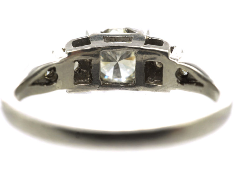 Art Deco Platinum Diamond Solitaire Ring with Step Cut Diamond Set Shoulders