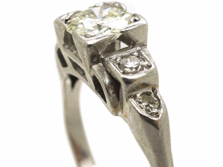 Art Deco Platinum Diamond Solitaire Ring with Step Cut Diamond Set Shoulders
