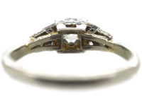 Art Deco Platinum & Diamond Solitaire Ring with Step Cut Diamond Shoulders