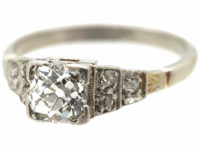 Art Deco Platinum & Diamond Solitaire Ring with Step Cut Diamond Shoulders