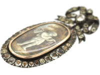 French Early 19th Century Silver & Paste Miniature Pendant of a Young Boy With Fishing Net & Fish