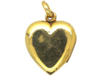 Edwardian 15ct Gold Heart Shaped Locket with Flower Motif set with a Sapphire & Diamonds