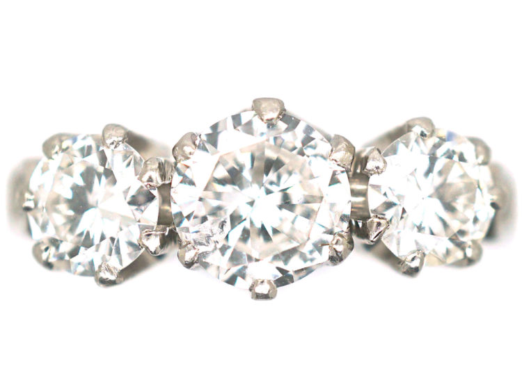 Platinum Three Stone Diamond Ring with Diamond Set Shoulders