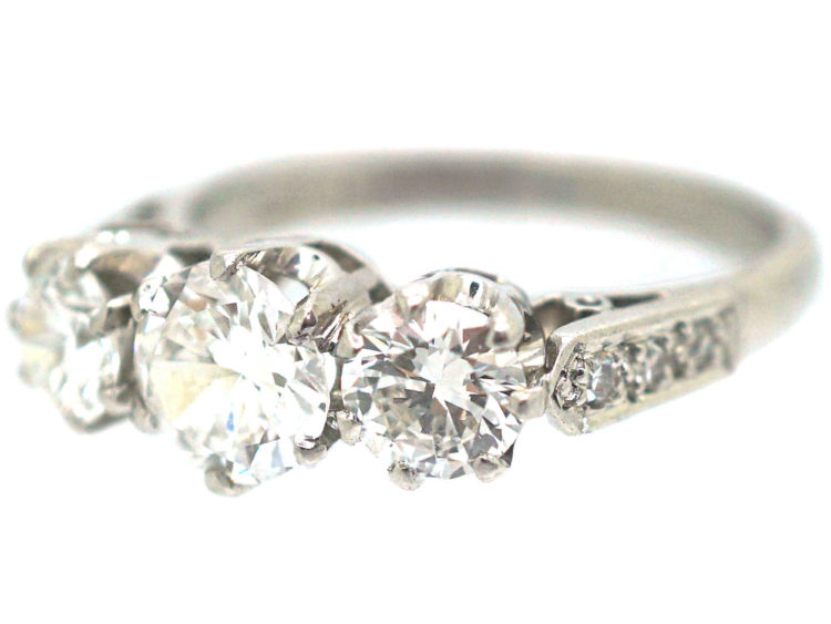 Platinum Three Stone Diamond Ring with Diamond Set Shoulders
