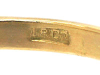 18ct Gold & Platinum, Diamond Solitaire Ring with a Baguette Diamond on Either Side