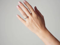 18ct Gold & Platinum, Diamond Solitaire Ring with a Baguette Diamond on Either Side