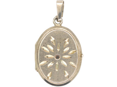 Silver Oval Locket with Starburst Motif
