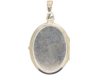 Silver Oval Locket with Starburst Motif