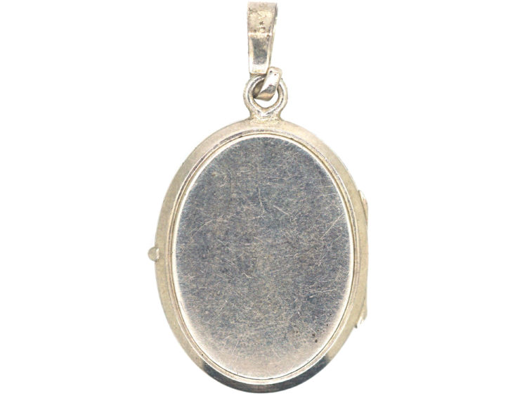 Silver Oval Locket with Starburst Motif