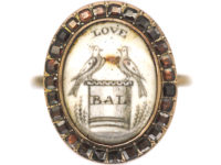 Georgian 9ct Gold Miniature Ring with Two Love Birds Surrounded by Flat Cut Garnets