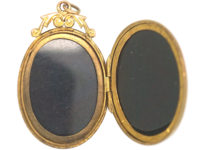 Edwardian 9ct Back & Front Oval Locket with Flower Motif