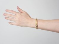 Edwardian 9ct Two Colour Gold Bangle with Buckle Motif