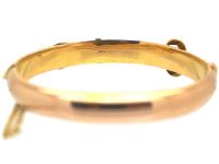 Edwardian 9ct Two Colour Gold Bangle with Buckle Motif