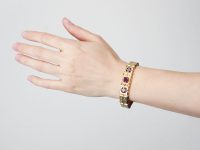 Victorian 15ct Gold Engraved Bracelet set with Three Almandine Garnets with Glazed Locket on the Reverse
