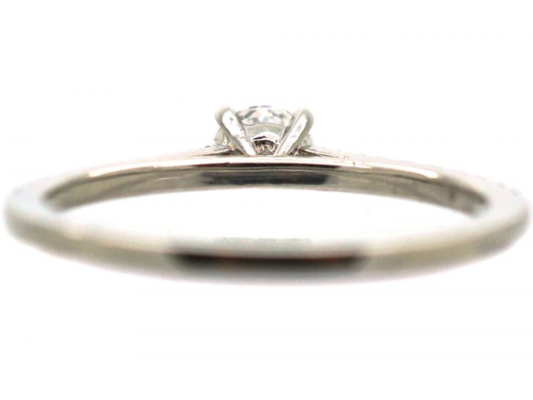 Platinum & Diamond Solitaire Ring with Diamond Set Shoulders by De Beers