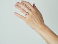 Art Deco Platinum, Diamond Solitaire Ring with Baguette Diamond Shoulders
