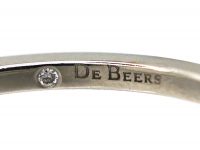 Platinum & Diamond Solitaire Ring with Diamond Set Shoulders by De Beers