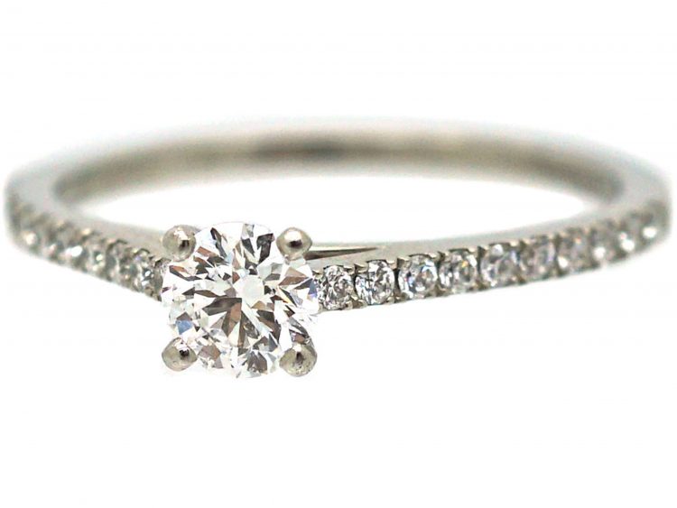 Platinum & Diamond Solitaire Ring with Diamond Set Shoulders by De Beers
