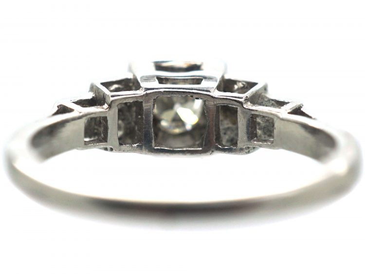 Art Deco Platinum, Diamond Solitaire Ring with Step Cut Shoulders set with Diamonds