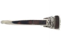 Art Deco Platinum, Diamond Solitaire Ring with Step Cut Shoulders set with Diamonds