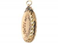 Edwardian Oval Shaped 9ct Gold Engraved Locket with Bow Top