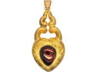 Victorian 15ct Gold Heart Shaped Pendant set with a Cabochon Garnet