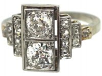 Art Deco Platinum, Two Stone Diamond Ring with Step Cut Shoulders set with Diamonds