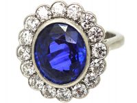 Platinum, 4.10 carat Sapphire & Diamond Oval Cluster Ring