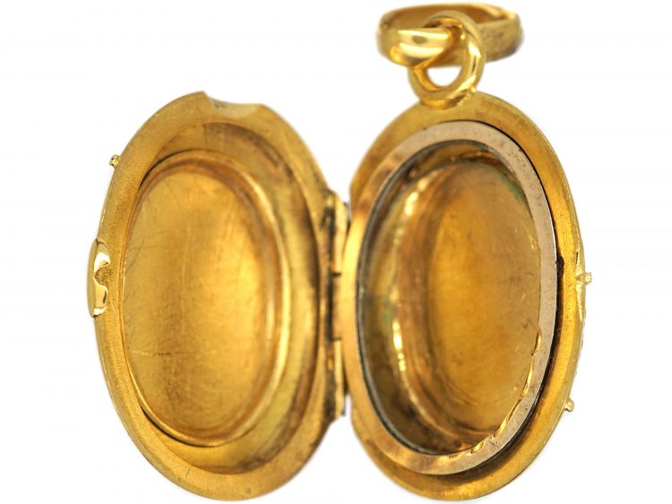 American 19th Century Gold Rush 18ct Gold Oval Locket set with Gold in Quartz