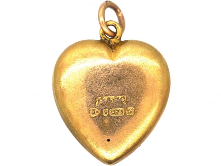 Edwardian 9ct Gold Heart Shaped Pendant set with Three Rubies