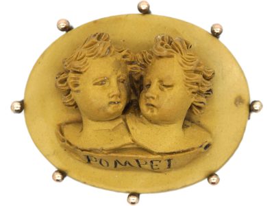 Grand Tour Brooch of Two Children Carved in Lava Stone