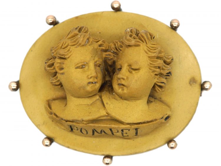Grand Tour Brooch of Two Children Carved in Lava Stone