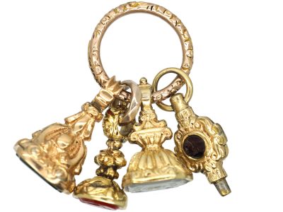Georgian Group of Three Gold Cased Seals & a Watch Key on a Gold Split Ring