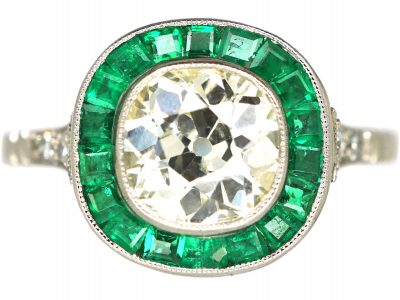 Platinum, Large Single Diamond Solitaire Ring with Calibre Emerald Frame