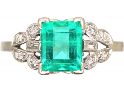 Art Deco Platinum, Rectangular Cut Emerald Ring with Diamond Set Shoulders