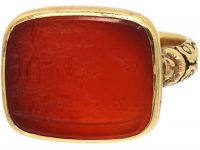 Georgian 15ct Gold Ring set with a Carnelian Engraved Intaglio with a Shooting Scene