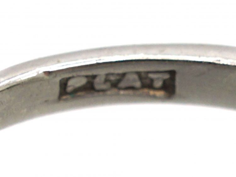 Art Deco Platinum, Transitional Cut Diamond Solitaire Ring with Step Cut Shoulders set with Baguette Diamonds