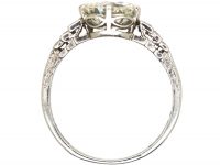 Art Deco Platinum, Transitional Cut Diamond Solitaire Ring with Step Cut Shoulders set with Baguette Diamonds