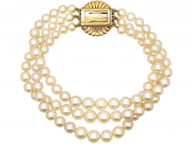 Three Row Cultured Pearl Bracelet with a Victorian Natural Split Pearl, Green Enamel & Topaz Clasp