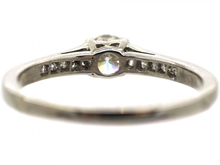 18ct White Gold Diamond Solitaire Ring with Princess Cut Diamond Shoulders