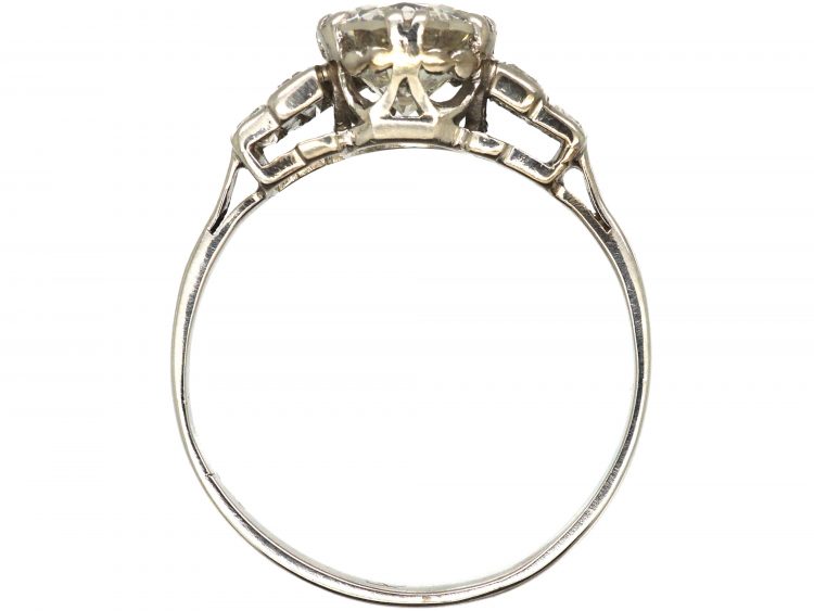 Art Deco Platinum, Diamond Solitaire Ring with Stepped Shoulders set with Baguette Diamonds