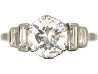 Art Deco Platinum, Diamond Solitaire Ring with Stepped Shoulders set with Baguette Diamonds
