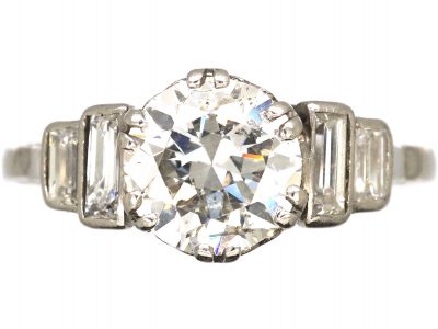 Art Deco Platinum, Diamond Solitaire Ring with Stepped Shoulders set with Baguette Diamonds