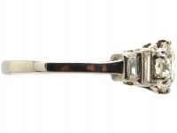 Art Deco Platinum, Diamond Solitaire Ring with Stepped Shoulders set with Baguette Diamonds
