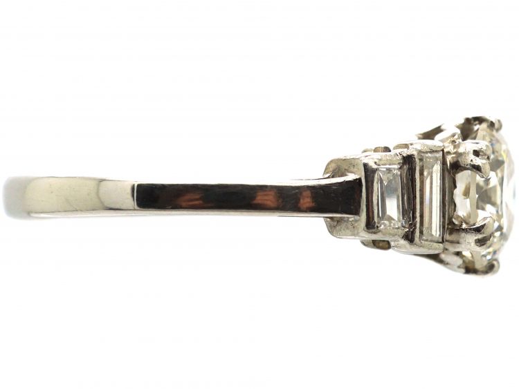 Art Deco Platinum, Diamond Solitaire Ring with Stepped Shoulders set with Baguette Diamonds