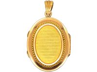 French 18ct Gold Oval Shaped Locket with a Flower Motif set with Natural Split Pearls